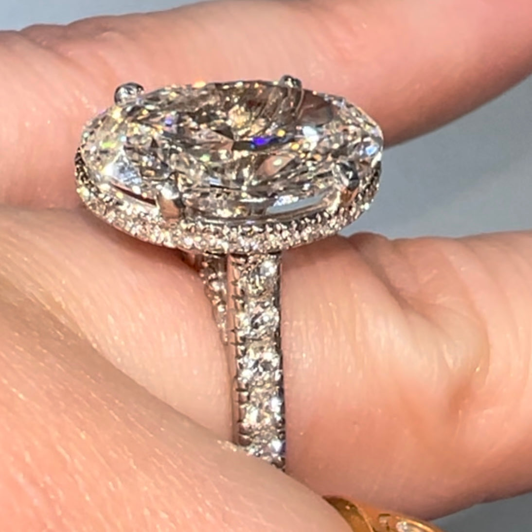 New platinum 6.09TCW main lab created oval diamond plus ~1TCW natural diamonds on the sides ring