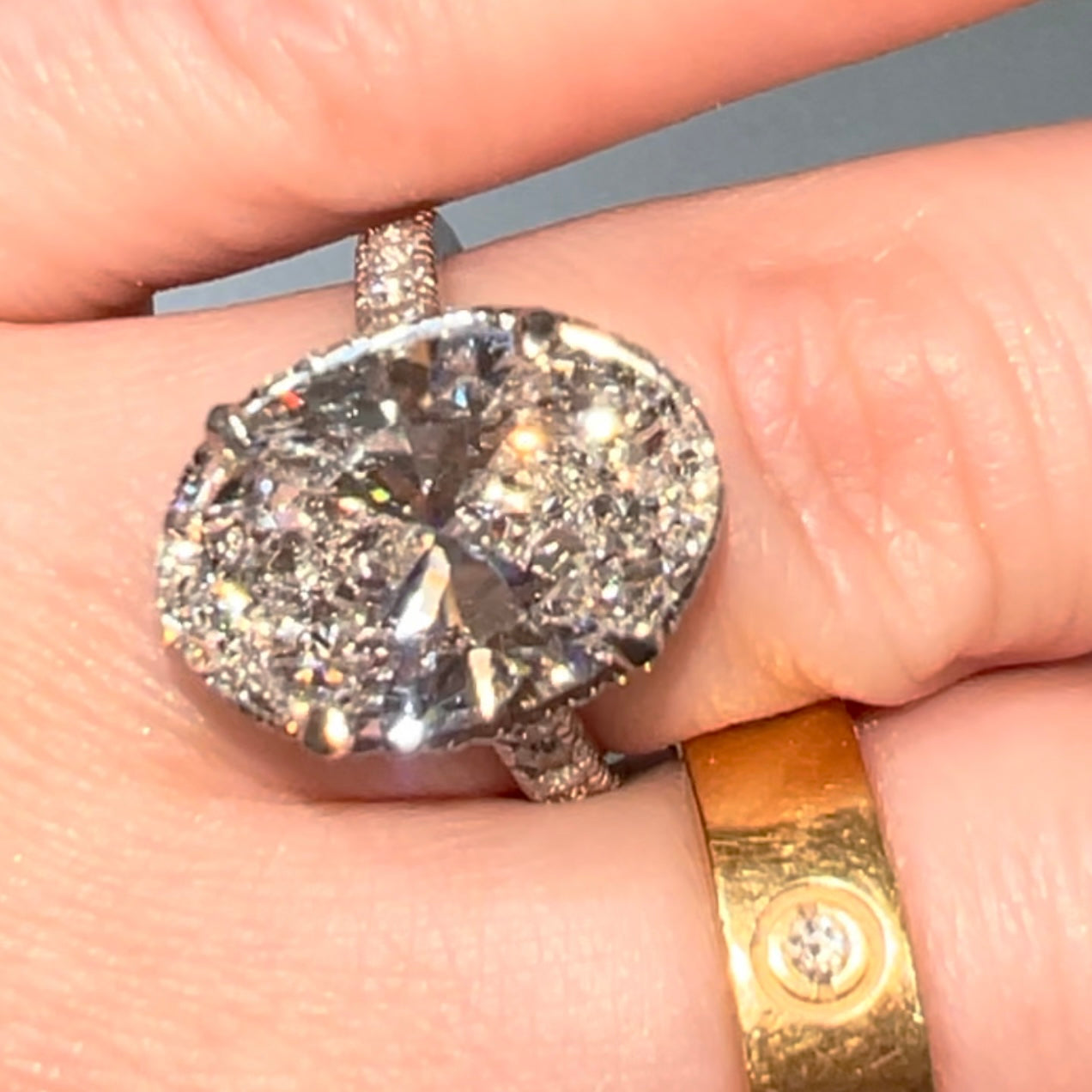 New platinum 6.09TCW main lab created oval diamond plus ~1TCW natural diamonds on the sides ring