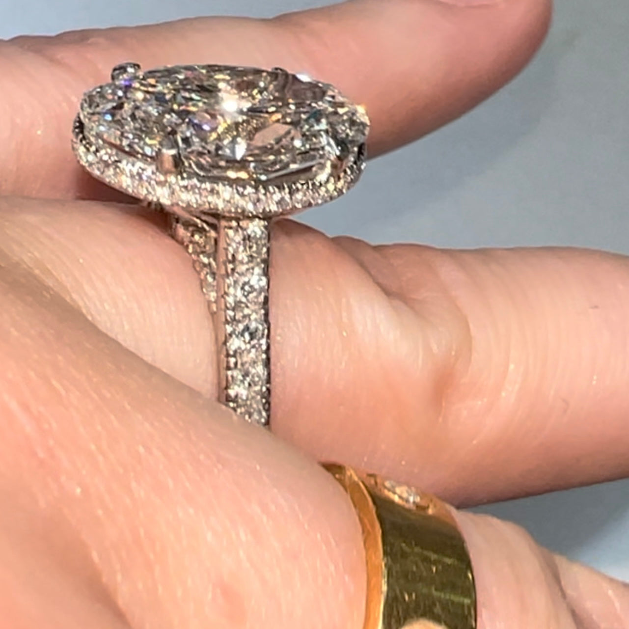 New platinum 6.09TCW main lab created oval diamond plus ~1TCW natural diamonds on the sides ring