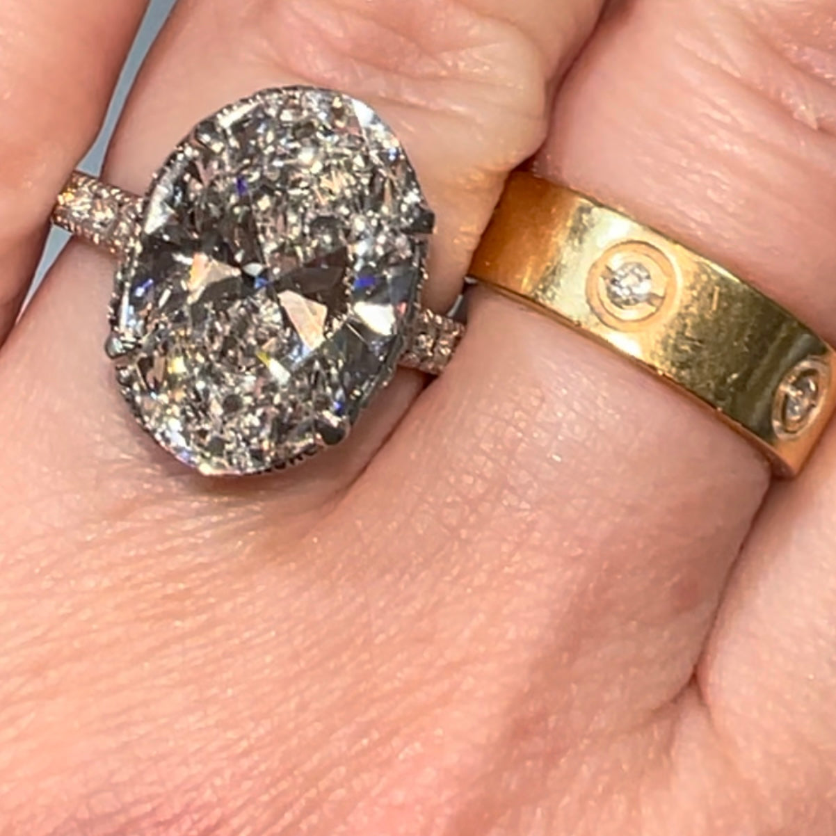 New platinum 6.09TCW main lab created oval diamond plus ~1TCW natural diamonds on the sides ring