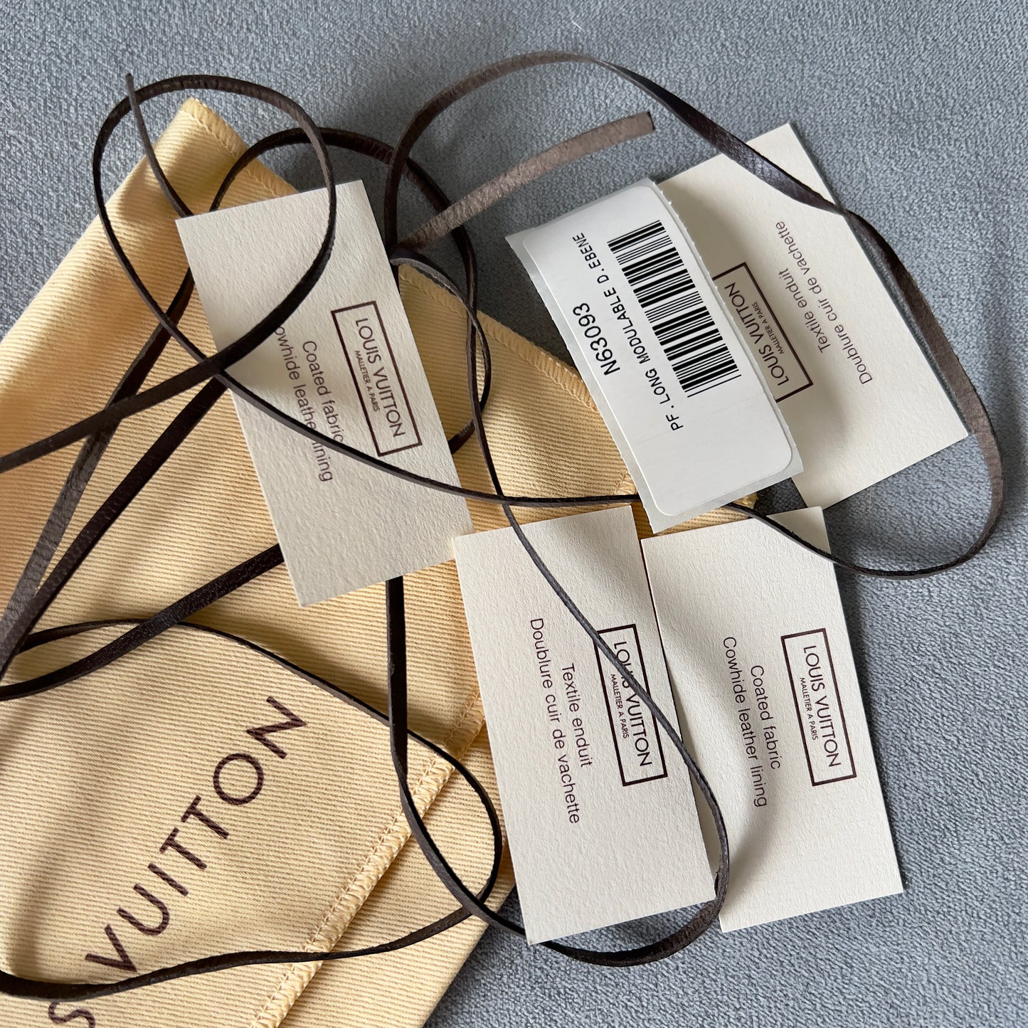 LOUIS VUITTON Pouch + Leather String + Tags + Box 9.75x5x1.75 inches