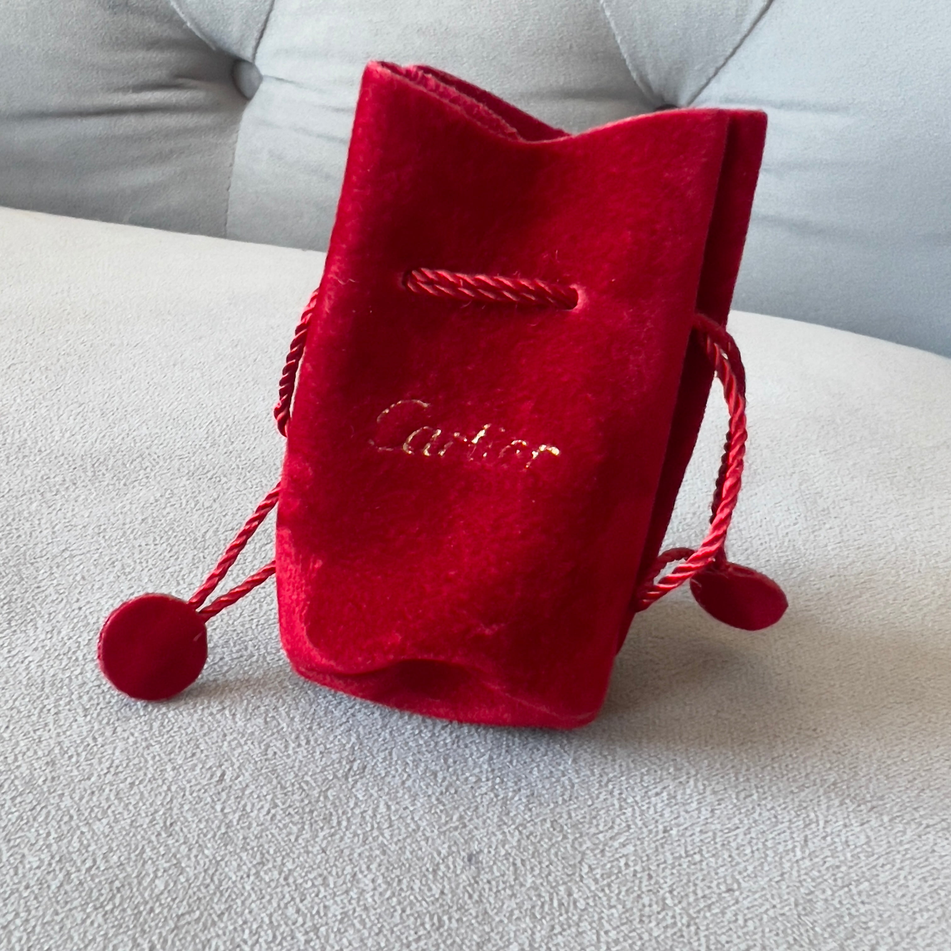 Cartier best sale pouch bag