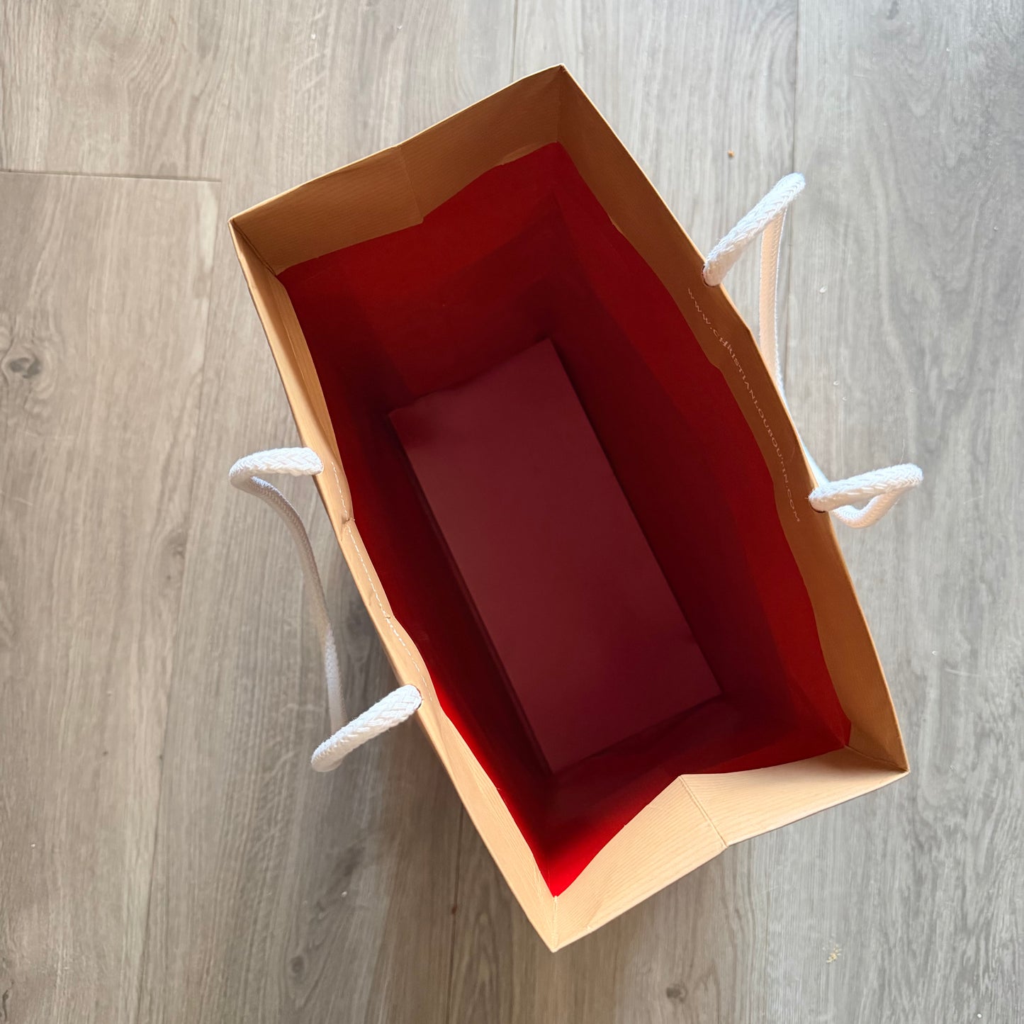 Christian Louboutin paper bag with rope handles