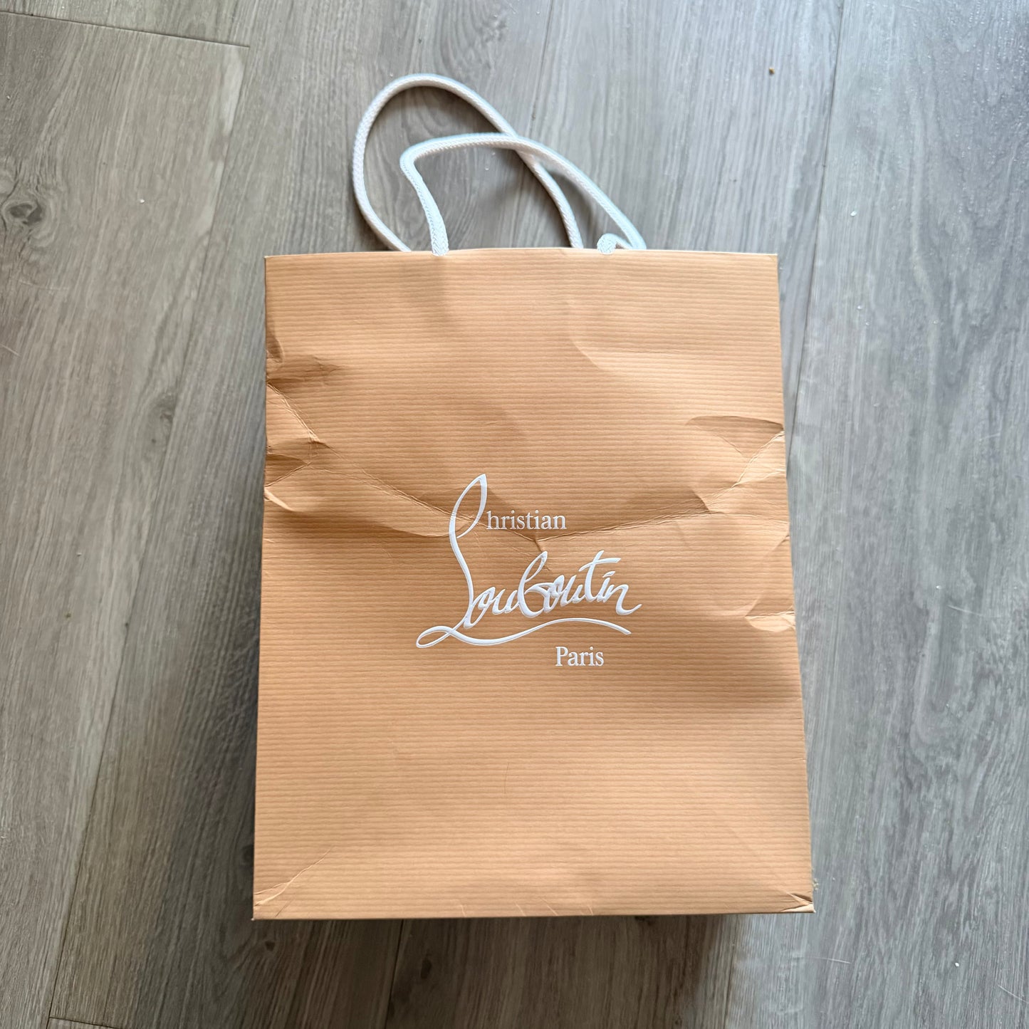 Christian Louboutin paper bag with rope handles