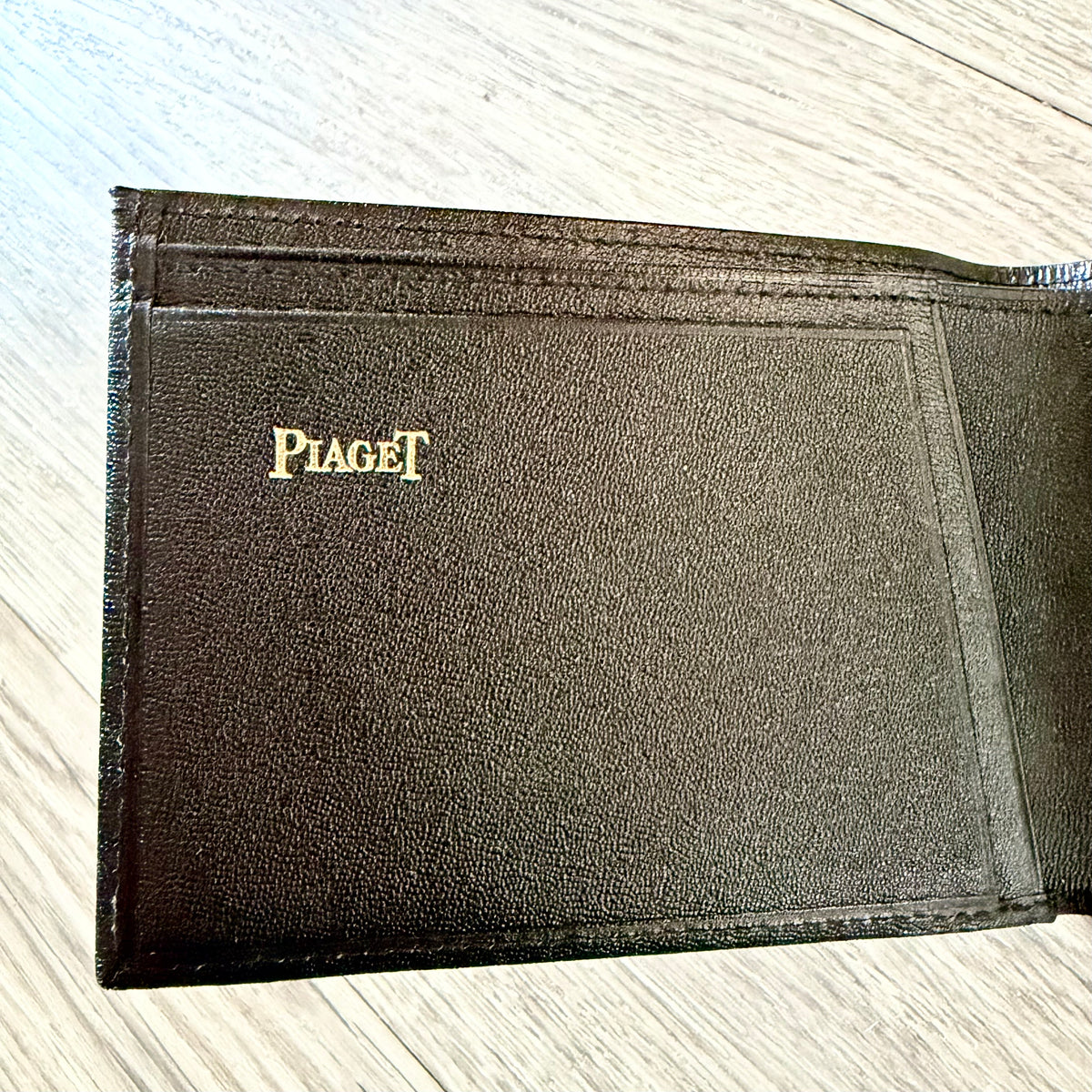 PIAGET Bi-Fold Black Leather Wallet with Gold Accents + Outer Box 7.75x4x1”
