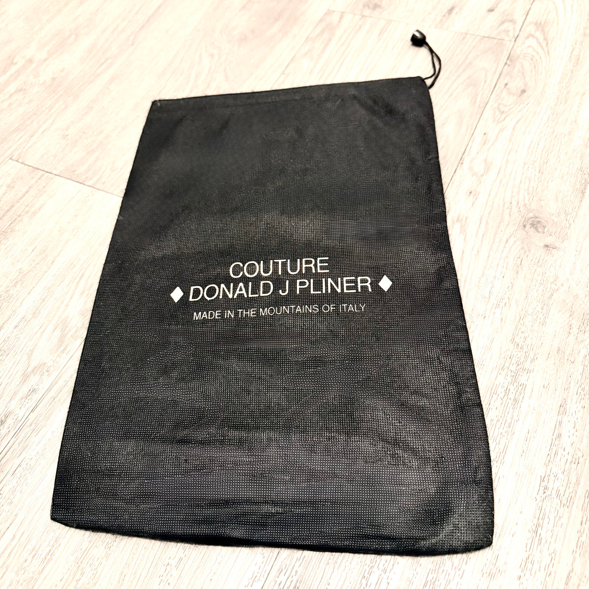 Couture Donald J. Pliner black drawstring dust bag with gold logo 14.5x10”