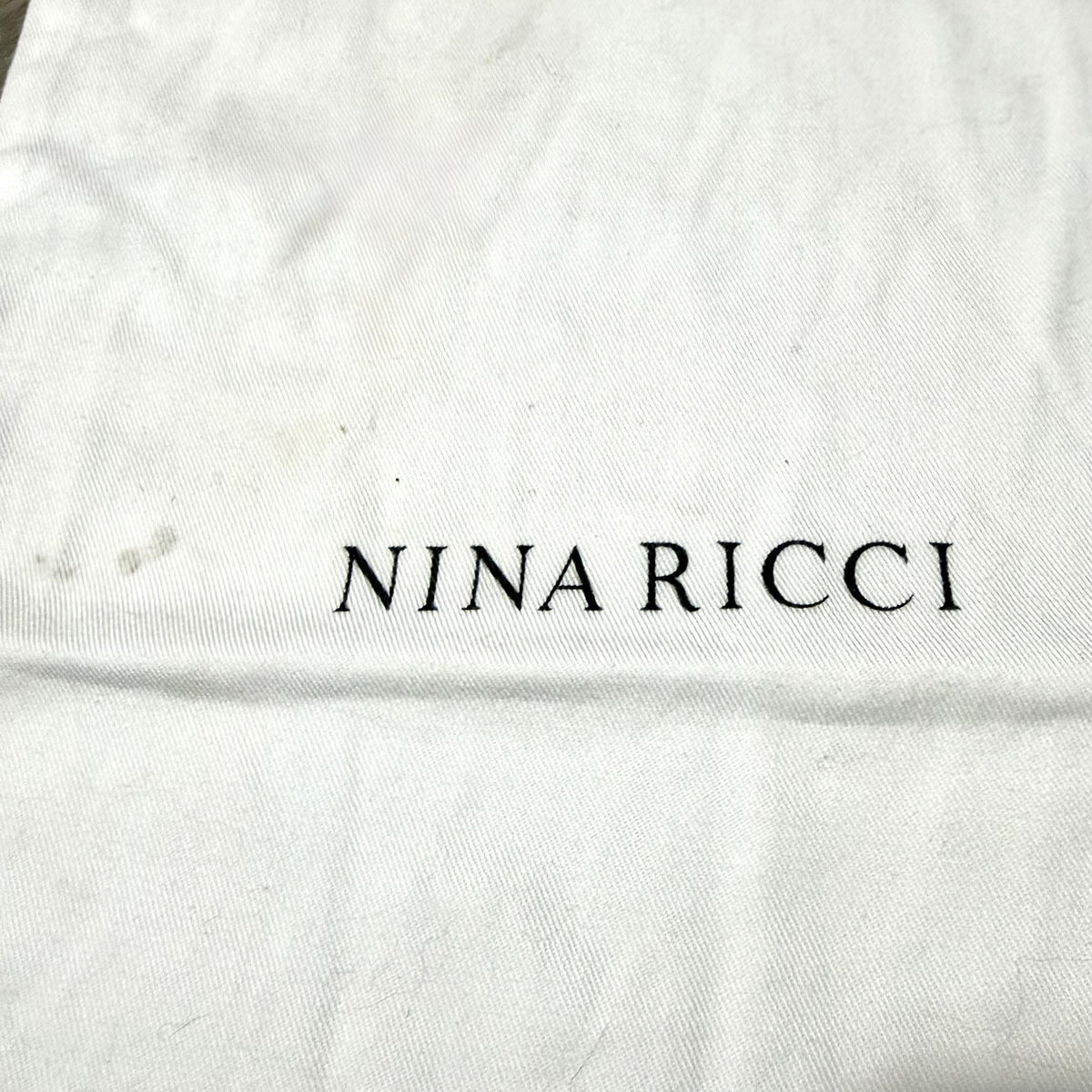 NINA RICCI White Drawstring Dust Bag 15.20x10”