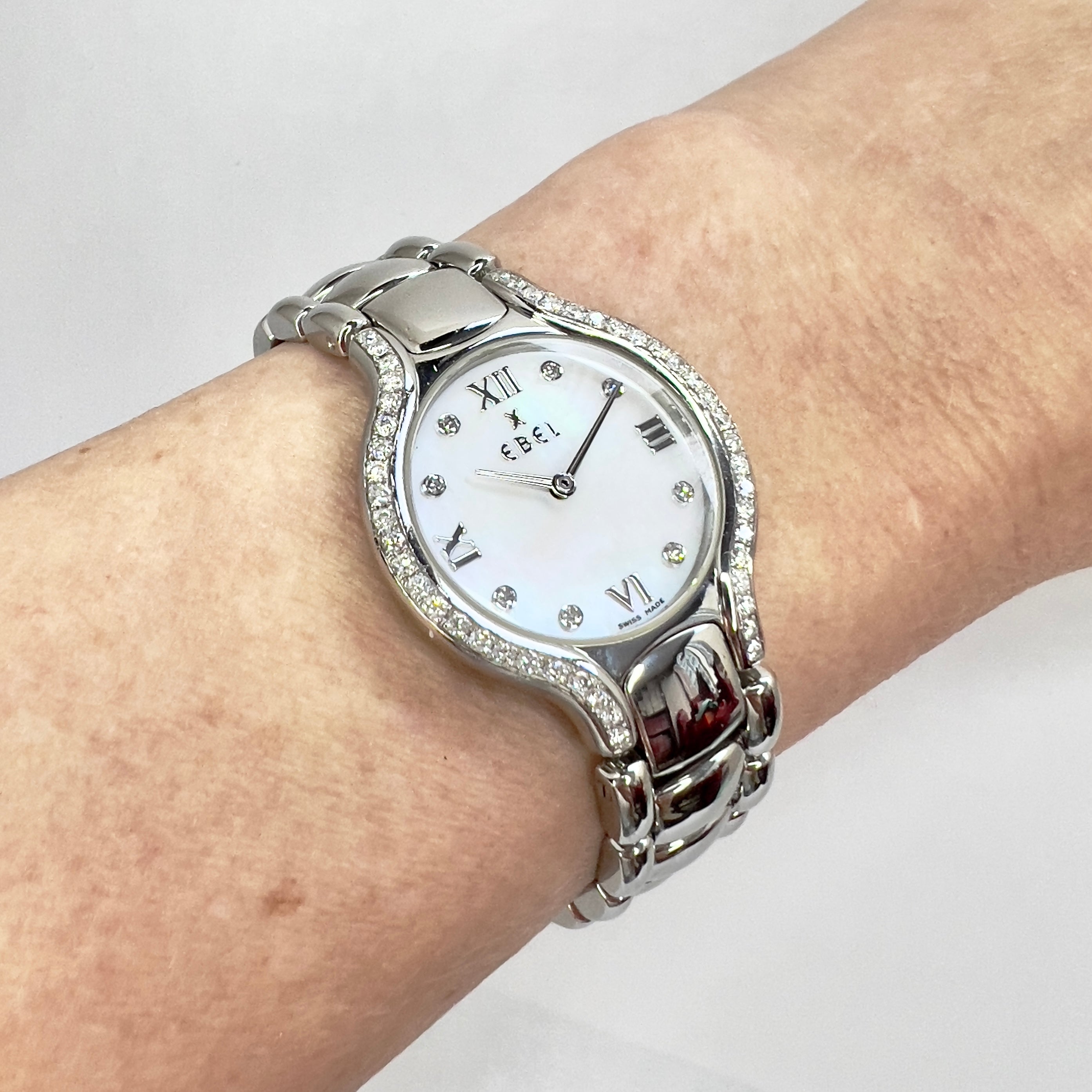 Ebel diamond bezel outlet watch